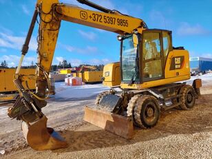 pelle sur pneus Caterpillar M315F